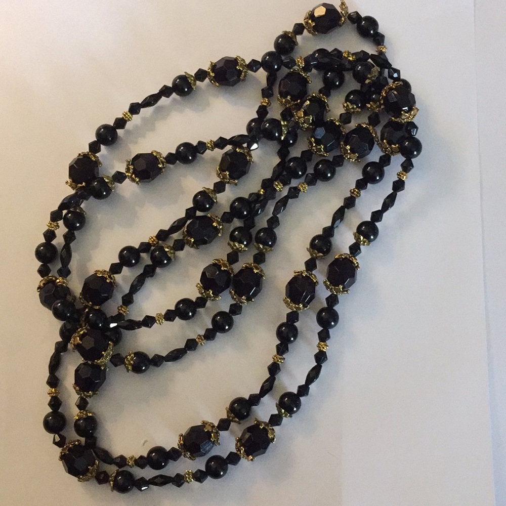 Long beautiful black and gold necklace
